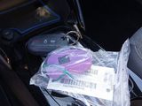 a bag of items in the back seat of a car