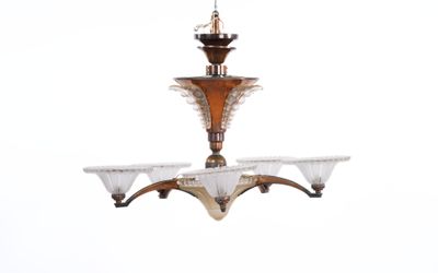 a chandelier with three lights hanging from the ceiling