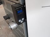 an image of a machine that is sitting on the ground