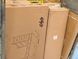 a large box of beer sitting on a pallet in a warehouse