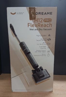 the box of the vacuum is open on the table