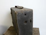 two old suitcases stacked on top of each other