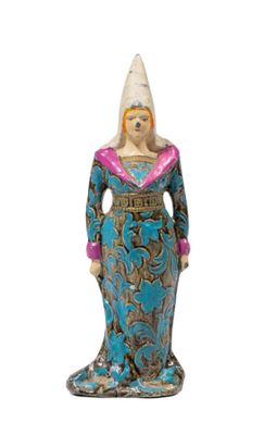 figurine of a woman in a blue dress with a hat on her head