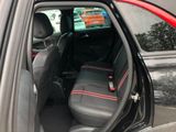 a car that has two seats in the back of it