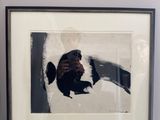a picture of a black and white dog in a picture frame