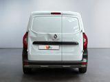the rear end of a white van parked in a room