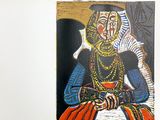 a picture of a painting of a woman sitting at a table