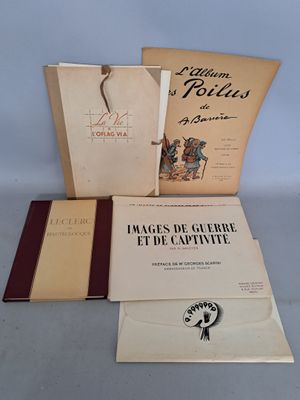 trois livres posés sur une table l'un à côté de l'autre