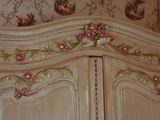 an image of a bedroom with a bed and a wallpaper