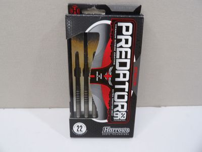 a box with a pair of scissors in it on a table