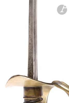 a close up of a sword on a white background