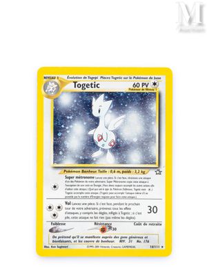 a close up of a pokemon card on a white surface
