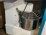 an image of a kitchen with a mixer on the counter