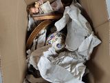 a cardboard box with a picture of a cat inside of it