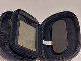 a black case with a cell phone inside of it
