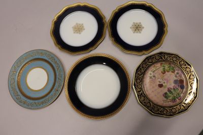 four plates that are sitting on a table