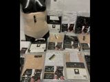 a lot of items on a table with a mannequin
