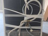 a white box with a bunch of wires inside of it