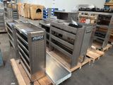 many metal shelves in a warehouse with boxes on them