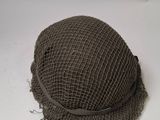 a hat that is sitting on a white surface