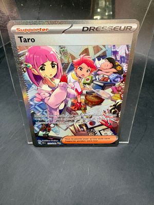 the box for the card game taro is sitting on a table