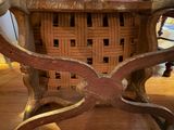 a wooden table with a basket on top of it