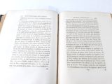 an open book that is sitting on a table