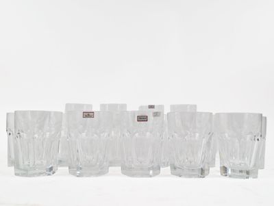 set of six clear glass tumbles in a line on a white surface