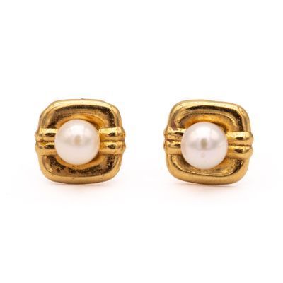 an image of a pair of gold and pearl earrings