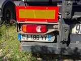a truck that is parked on the side of the road