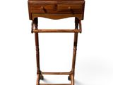 an image of a wooden stand with a coat hanger on top of it