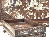 two trays that are sitting next to each other on a table