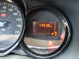a close up of a speedometer on a car ' s dashboard