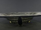 an image of a black and white bowl on a table