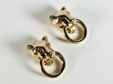 two pairs of gold earrings with a cat on them