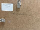 a piece of cardboard that has some type of electrical wire attached to it