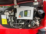 an image of a car engine with a control panel