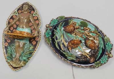 two decorative items that are sitting on a table