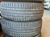 tire treads stacked on top of each other in a garage