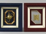 four framed pictures of horses in a row on a wall