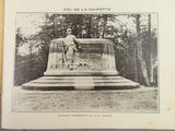 black and white photograph of a statue of a man in a park