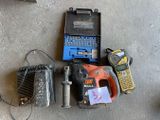 a lot of tools that are laying out on the floor