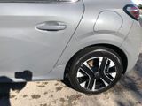 a silver car parked on the side of the road