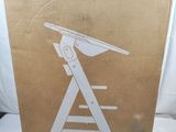 packaging for a new born set pre in a cardboard box on a bed