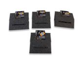 four pieces of black felt are sitting on top of each other