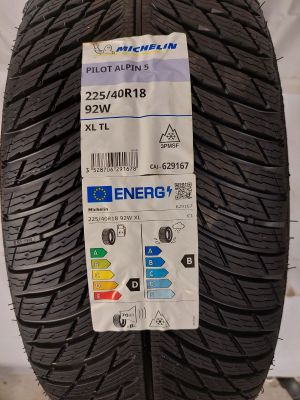 a close up of a tire with a sticker on it
