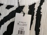 black and white zebra print sweater with a price tag on it