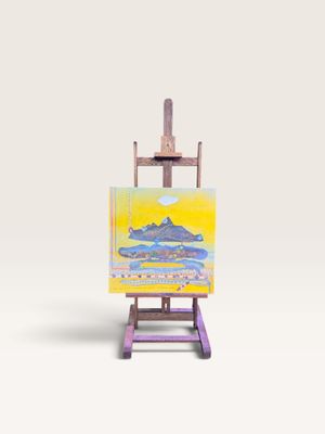 une image représentant un chevalet miniature sur lequel est posé un tableau