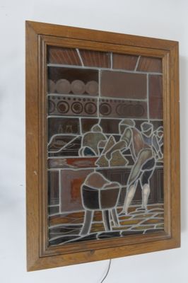« Boulanger pétrissant la pâte » Vitrail polychrome dans un …
