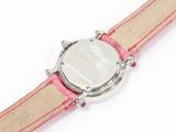 an image of a close up of a wrist watch on a white surface